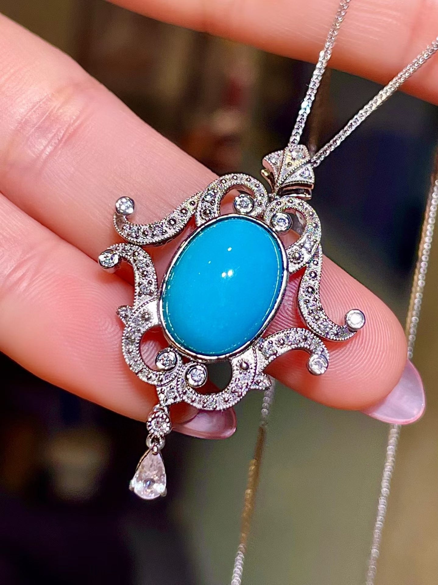 Pt950 Platinum Pendant with Oval Sleeping Beauty Turquoise 5.37ct and Diamond Pavé