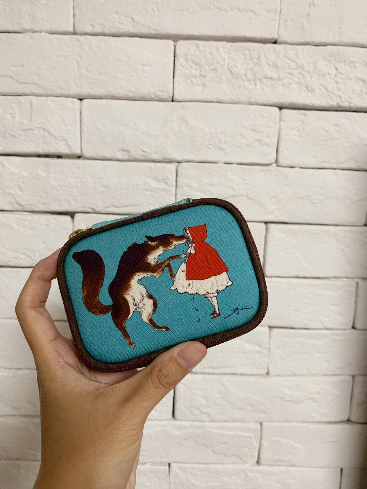 Pochette con zip illustrata e custodia interna rimovibile