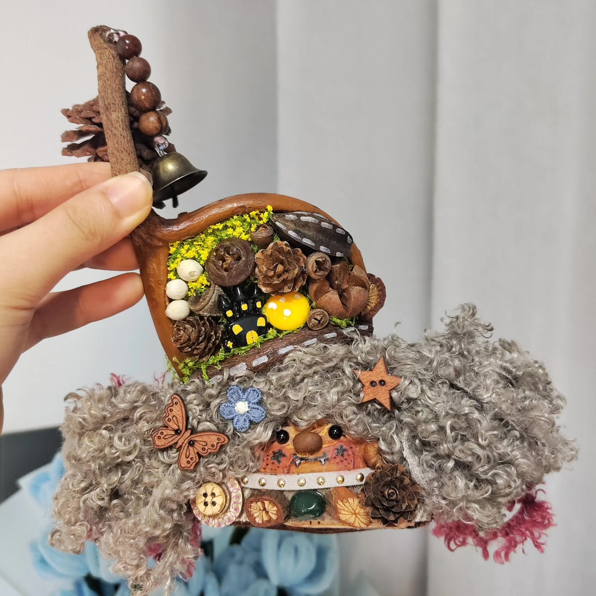 Double-Sided Handcrafted Figurine with Pinecone Bell