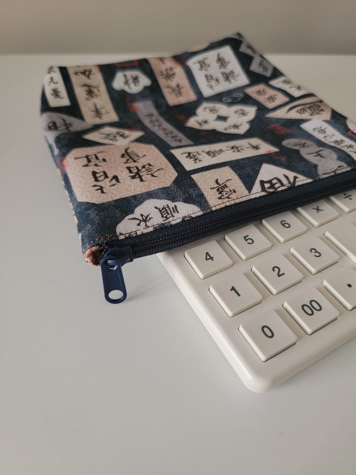 Calligraphy Print Zippered Pouch Indigo Blue