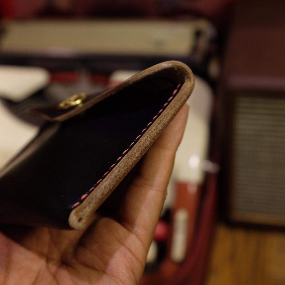 Black Horween Leather Bifold Wallet with Brass Snap Closure