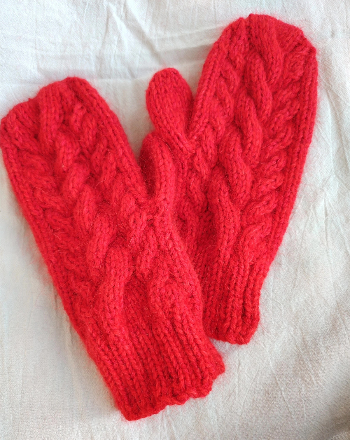 Mitones tejidos a mano de lana, cashmere y mohair con trenzas