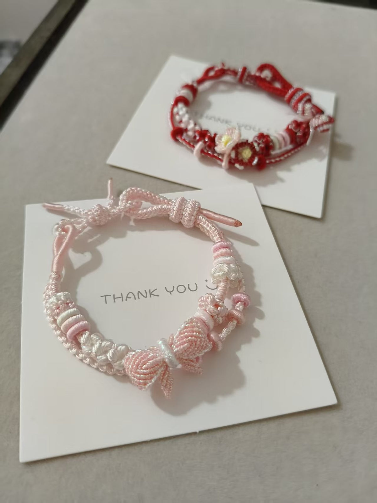Handwoven Pink White Gradient Bracelet with Bow