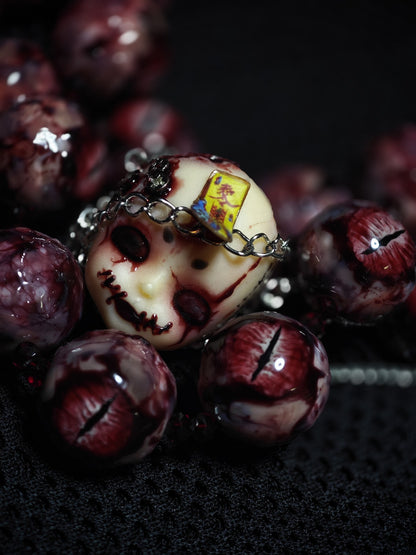 Handcrafted Doll Head Pendant with Eye Beads and Chain