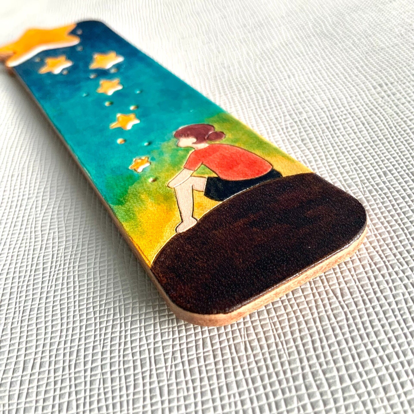 Hand-Painted Leather Bookmark with Star Cutouts