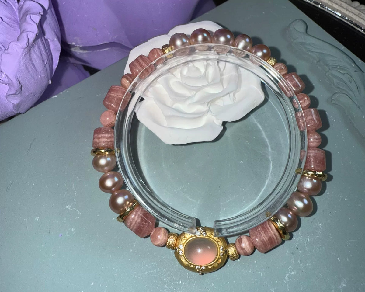 Rhodochrosit Perlenarmband mit rosaem Chalädon