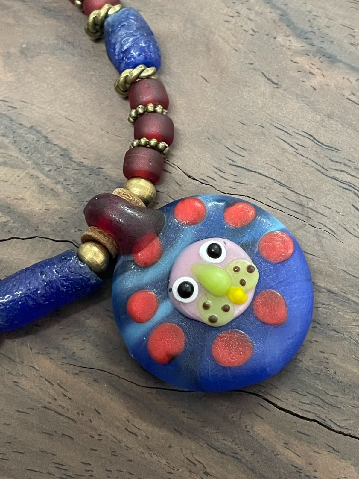 Phoenician Glass Lion Face Necklace