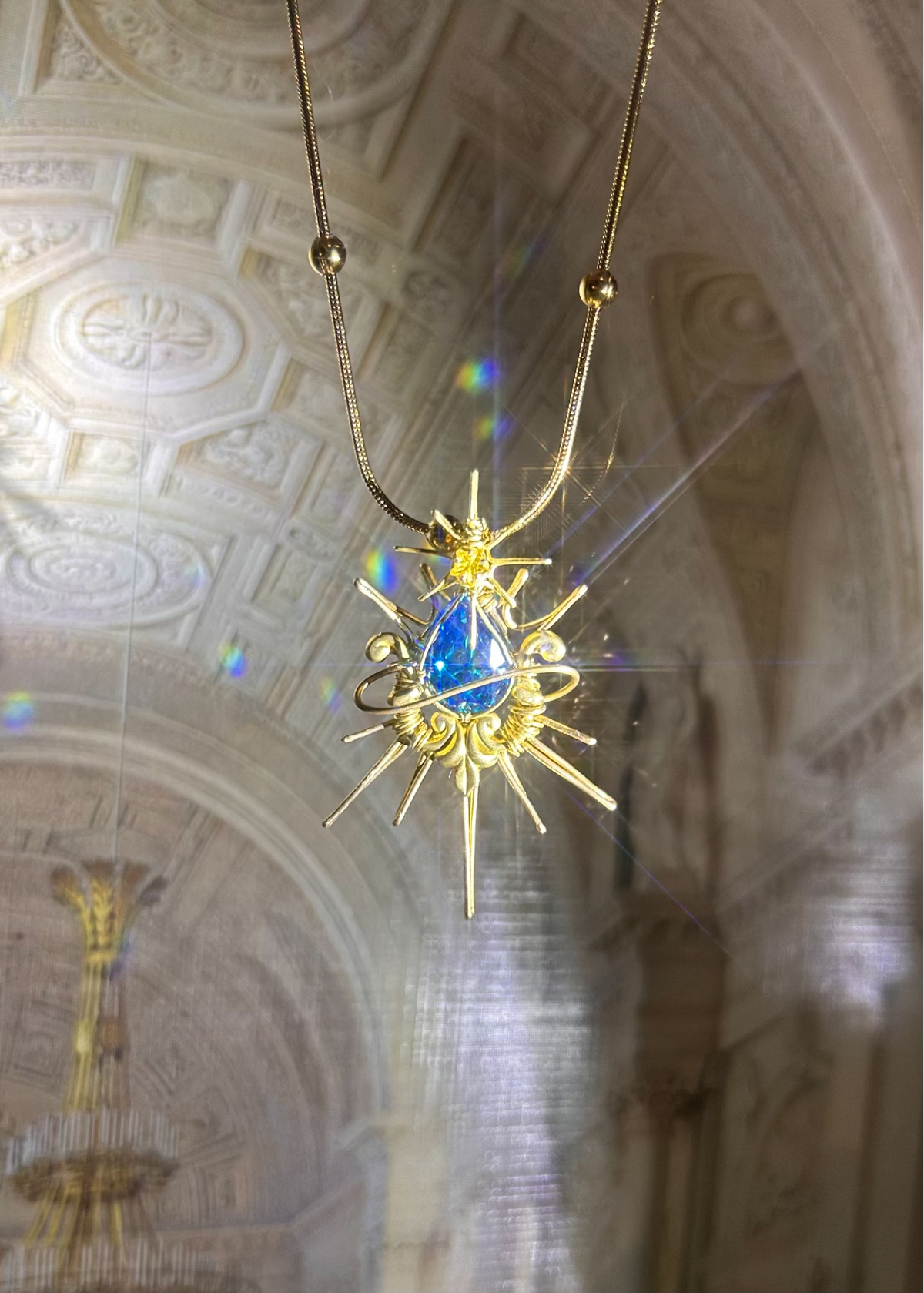 Wire-Wrapped Pendant with Aquamarine Zircon
