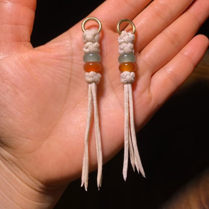 Handcrafted Tibetan Tassel with White Leather Cord and Green and Amber Beads
