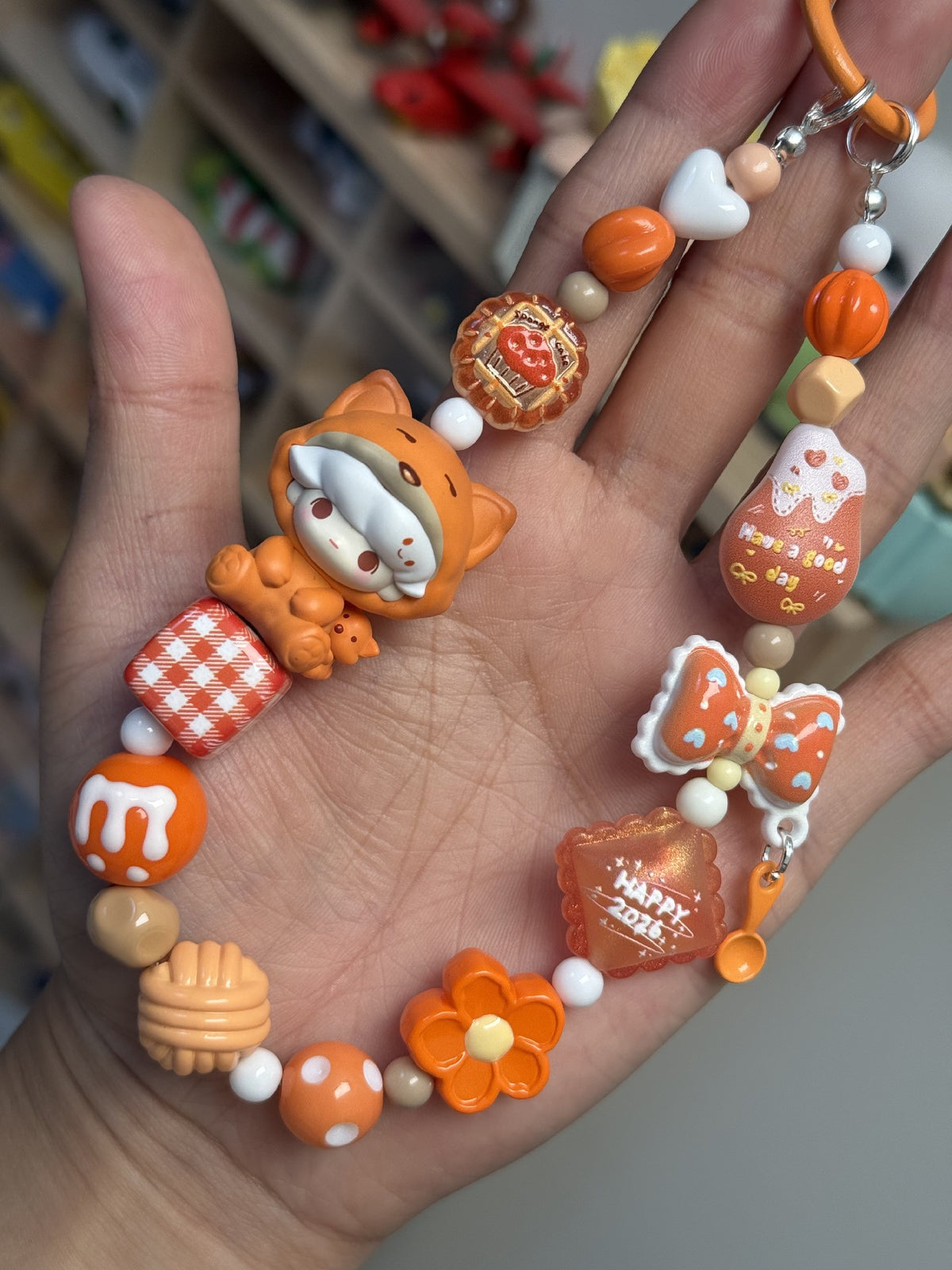 Dimoo Orange Onesie Beaded Phone Strap Charm