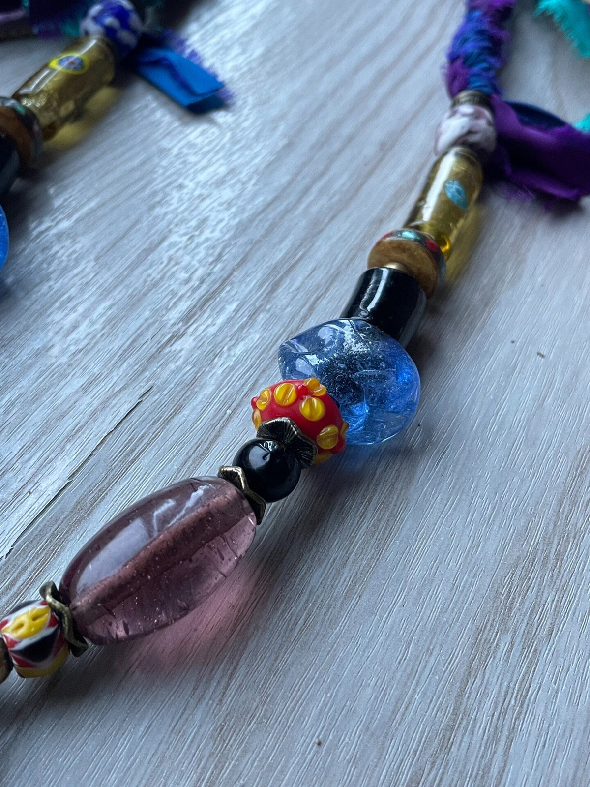 Phoenician Doll Glass Pendant Necklace