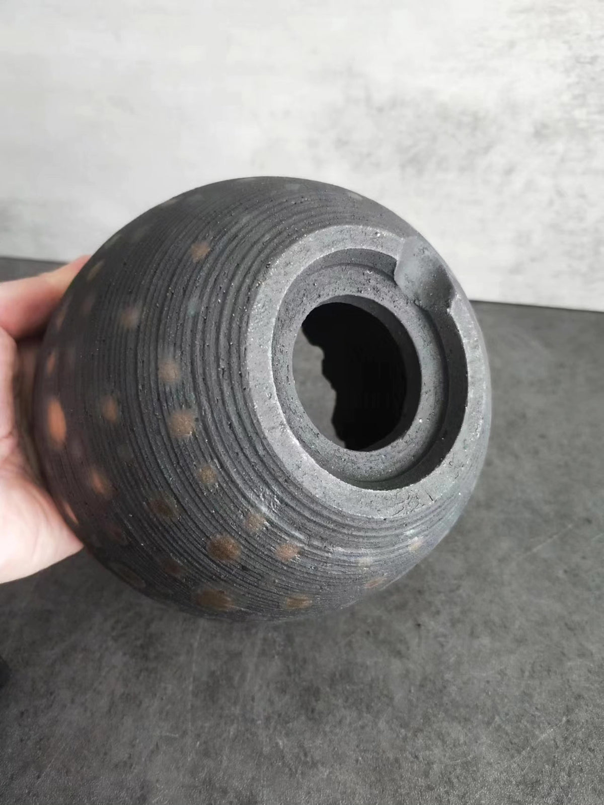 Handcrafted Ceramic Vessel with Serrated Rim