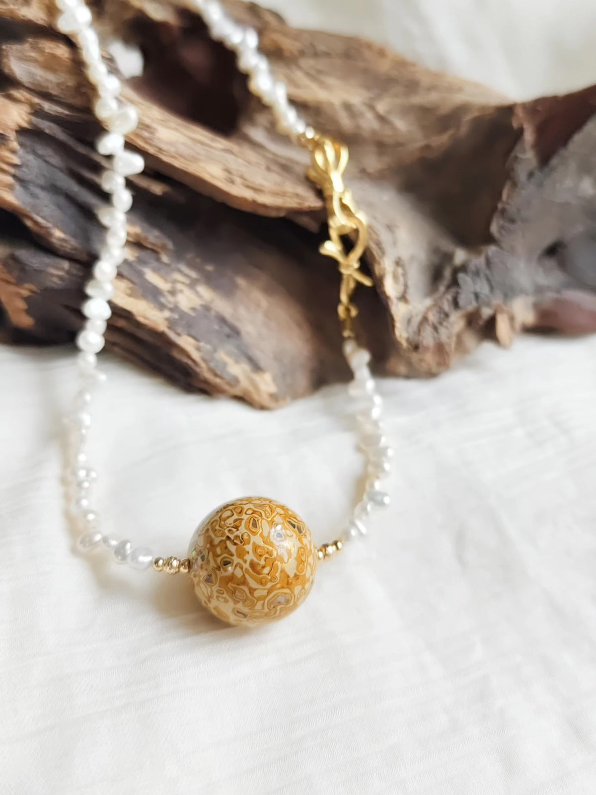 Natural Pearl Necklace with Amber Lacquer Bead
