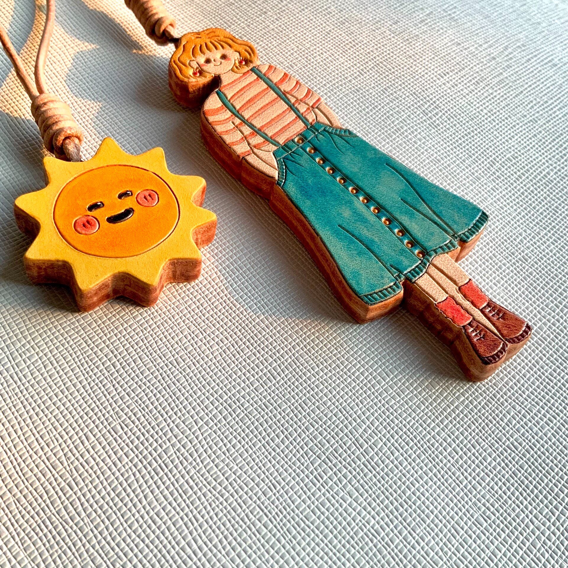 Hand-Painted Leather Girl and Sun Bag Charms