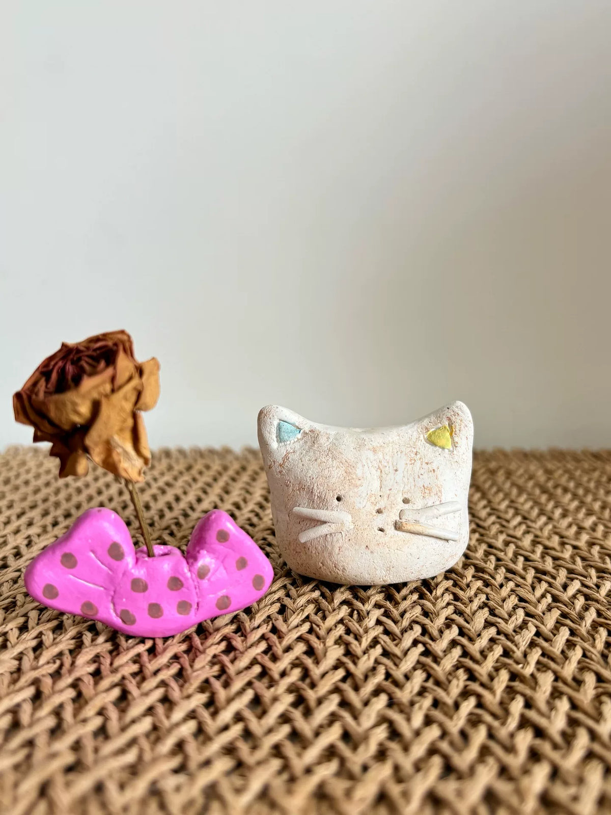 Handmade Clay Cat Figurine with Pink Bow