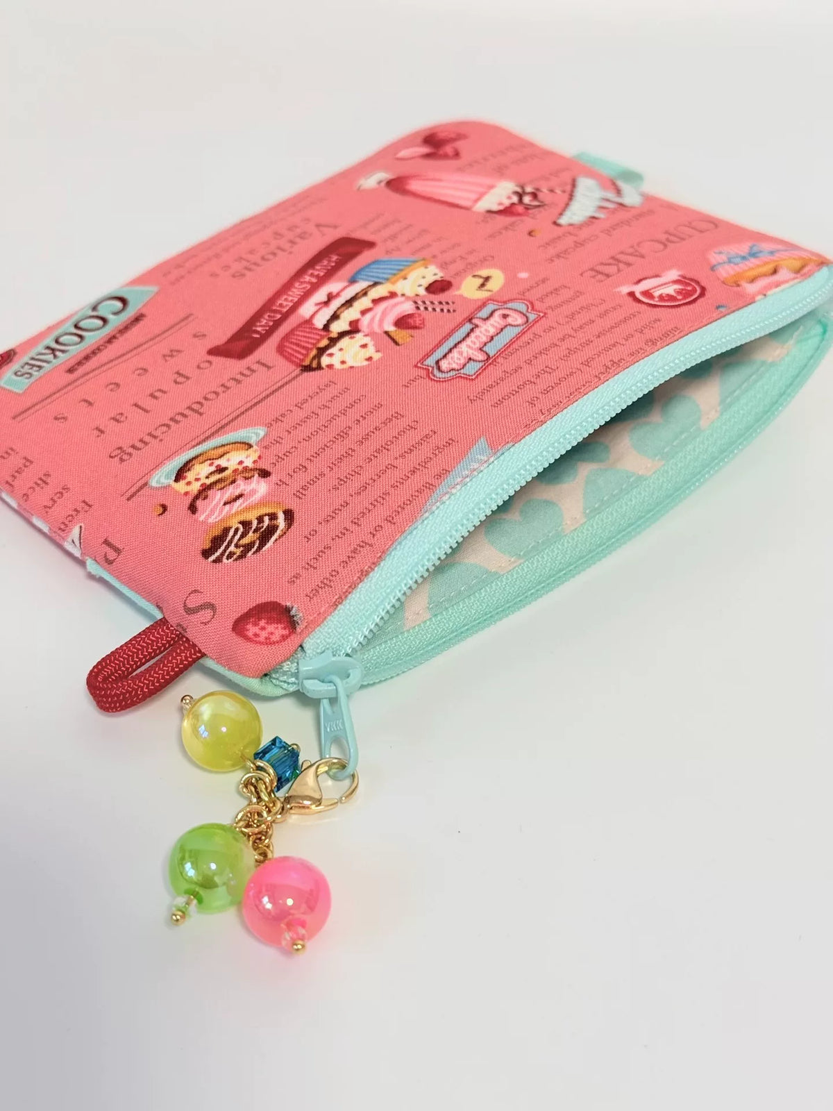 Estuche con cremallera y estampado de postres y forro menta
