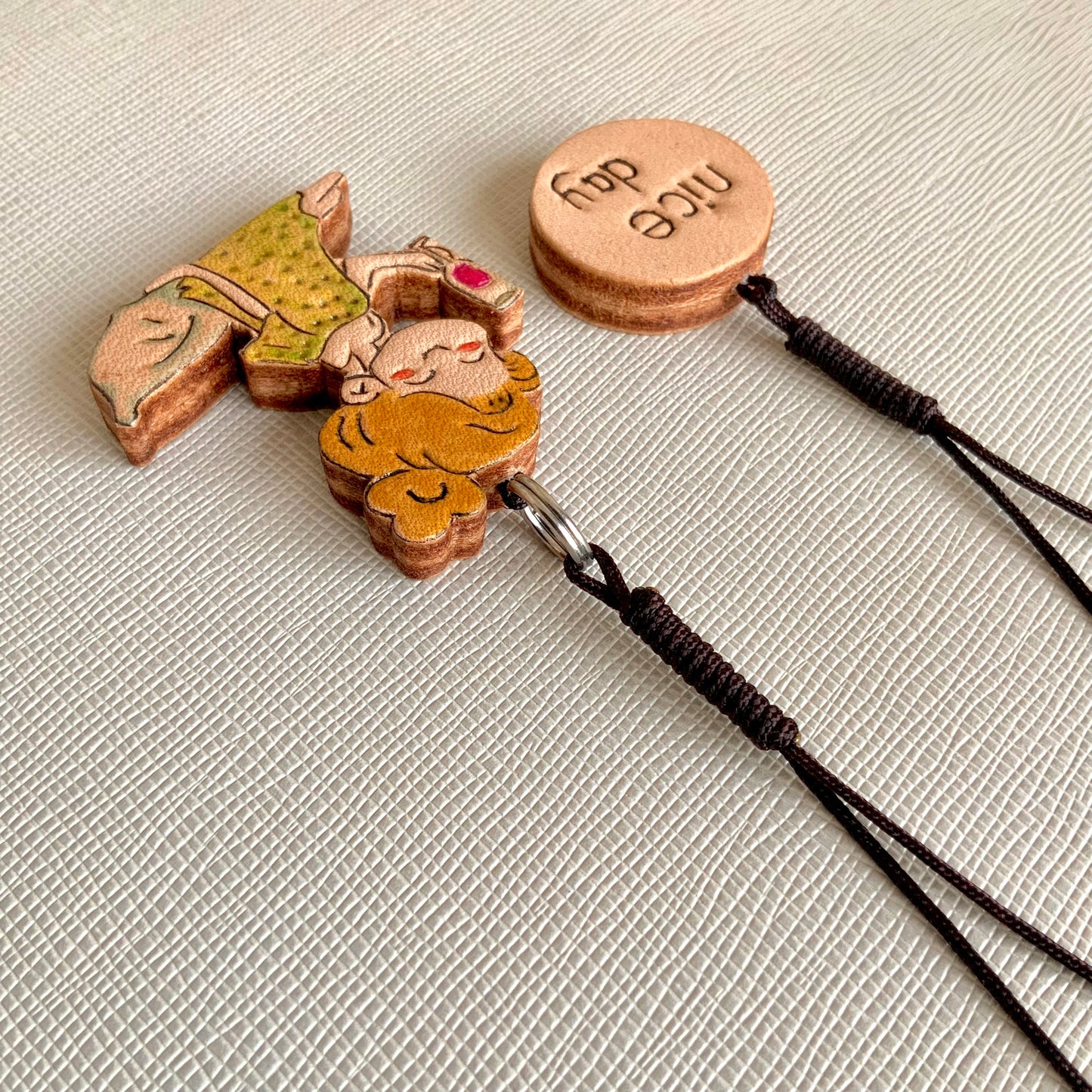 Leather Charm Set with Fairy Figure and "nice day" Disc