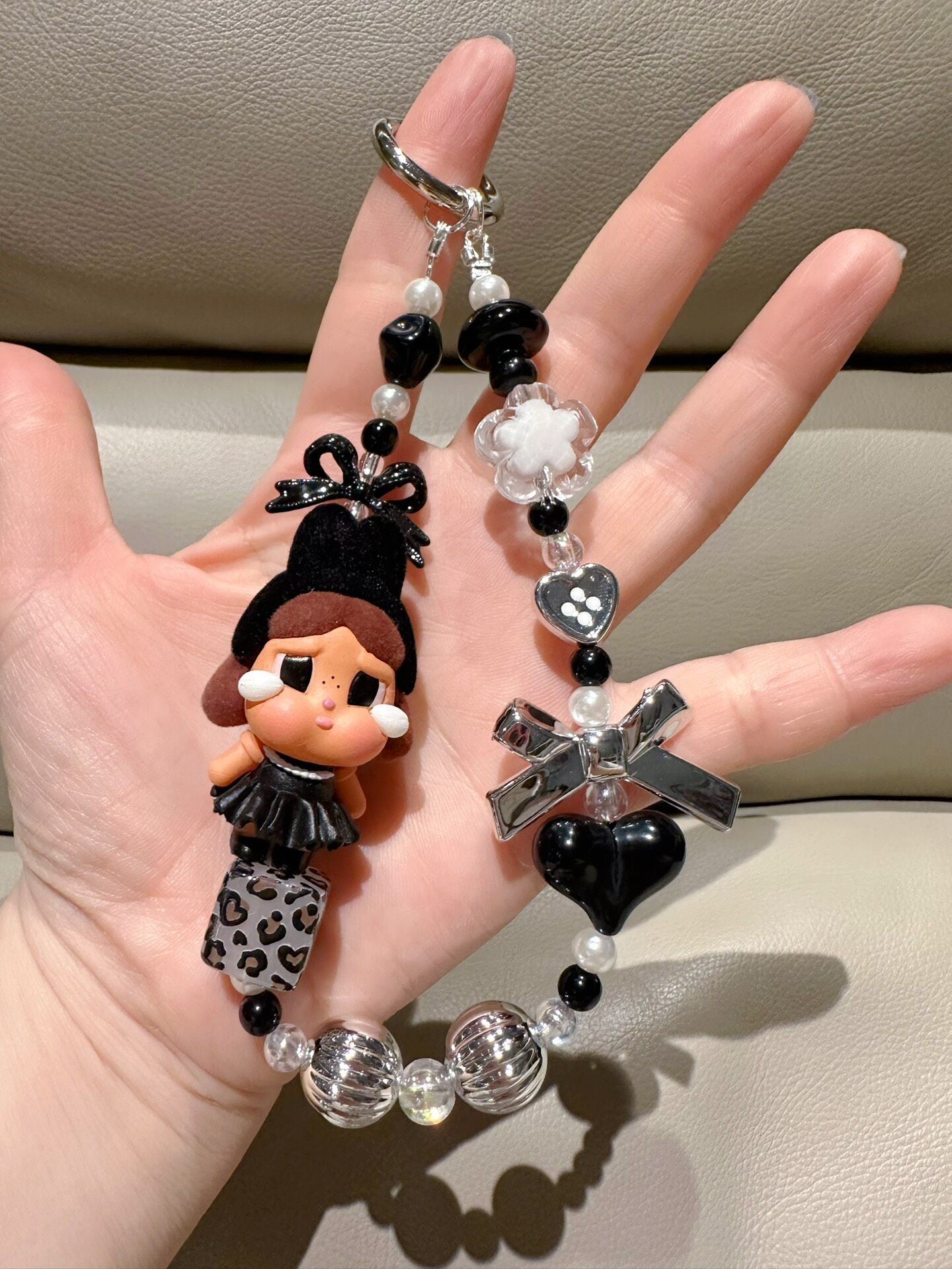 Black and White Elegant Character Figurine Keychain with Beads