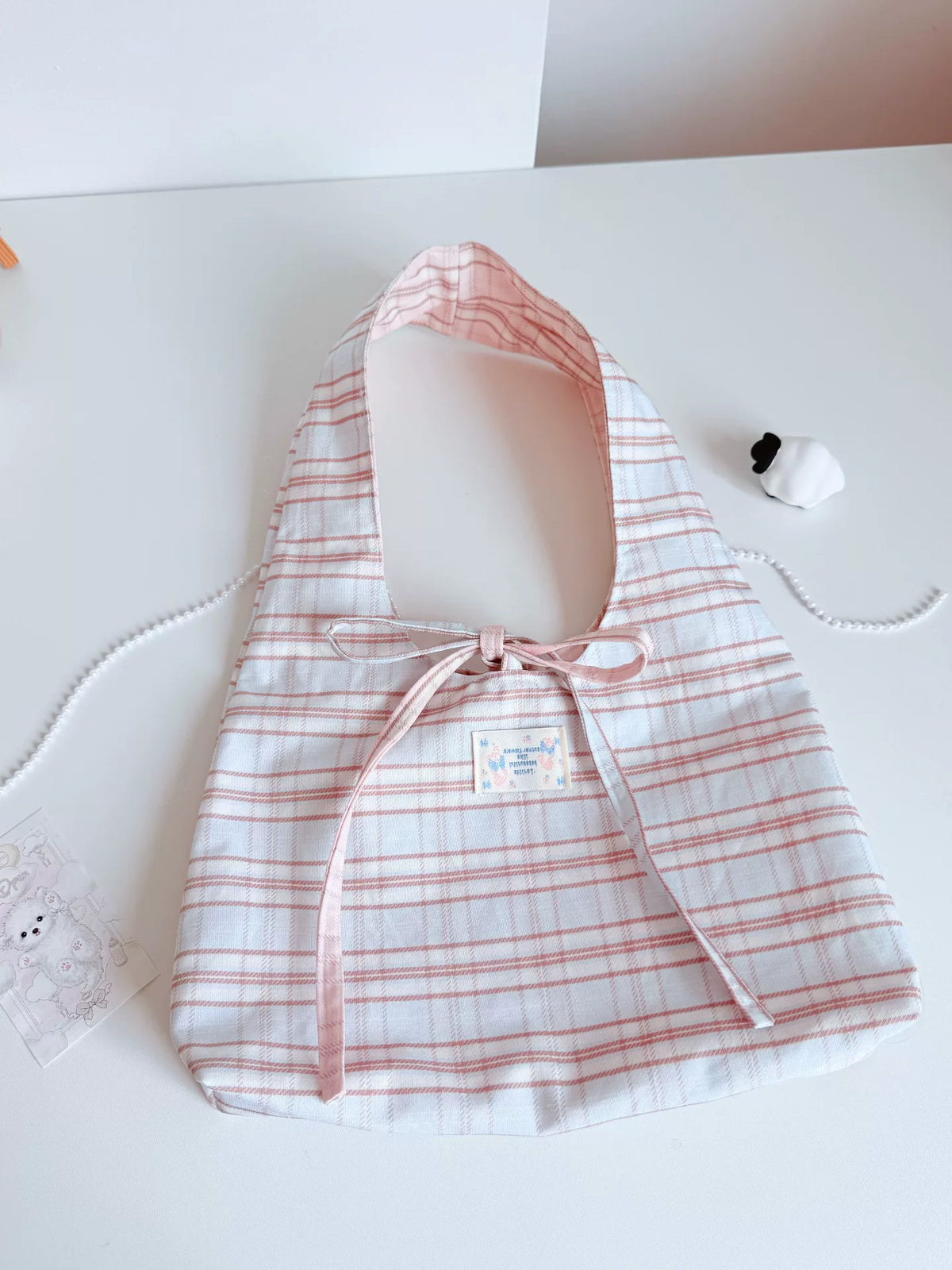 Sac hobo double face en tartan rose et blanc
