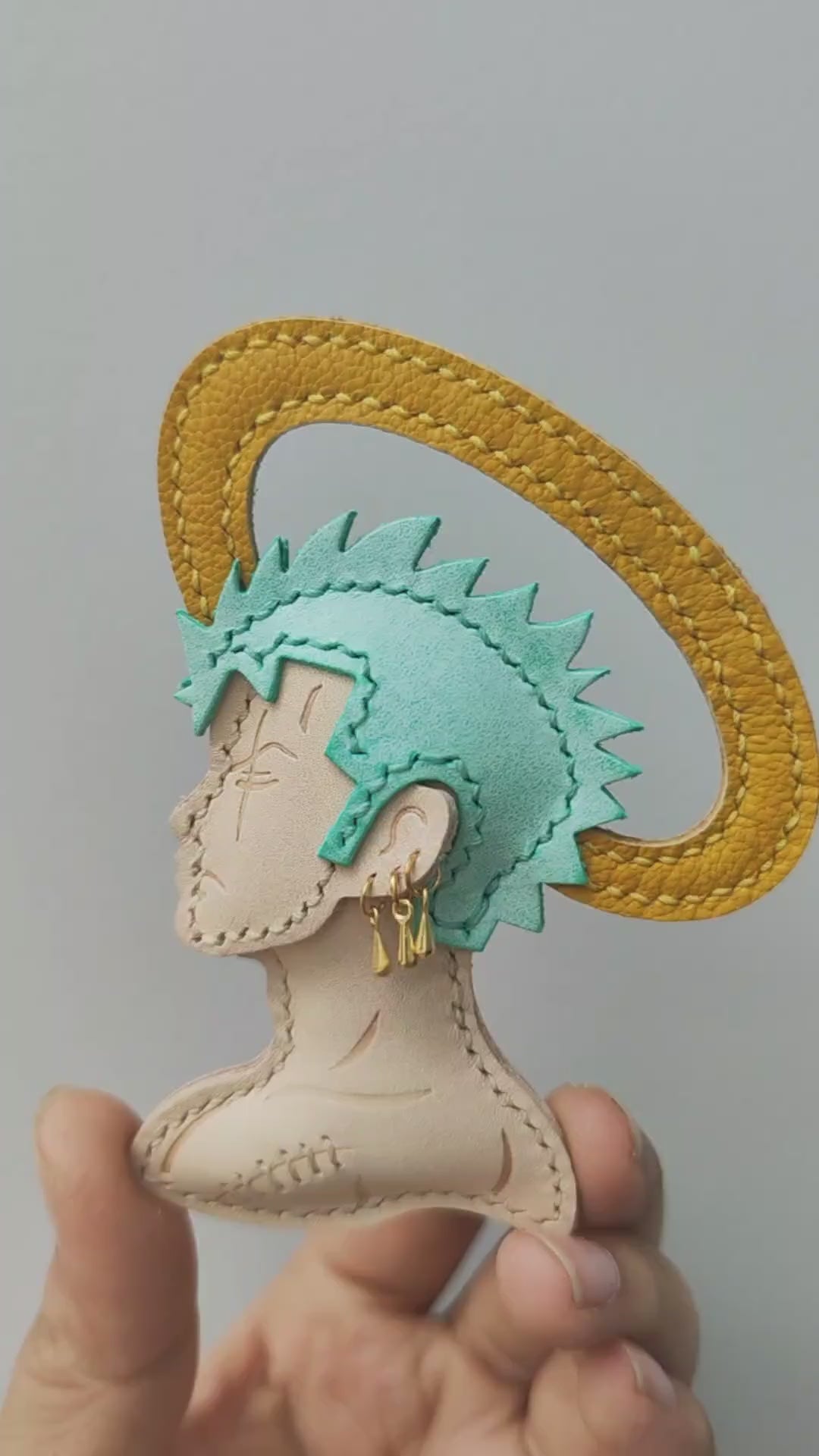 Handmade Leather Profile Charm with Teal Hair and Yellow Strap - Video 1
